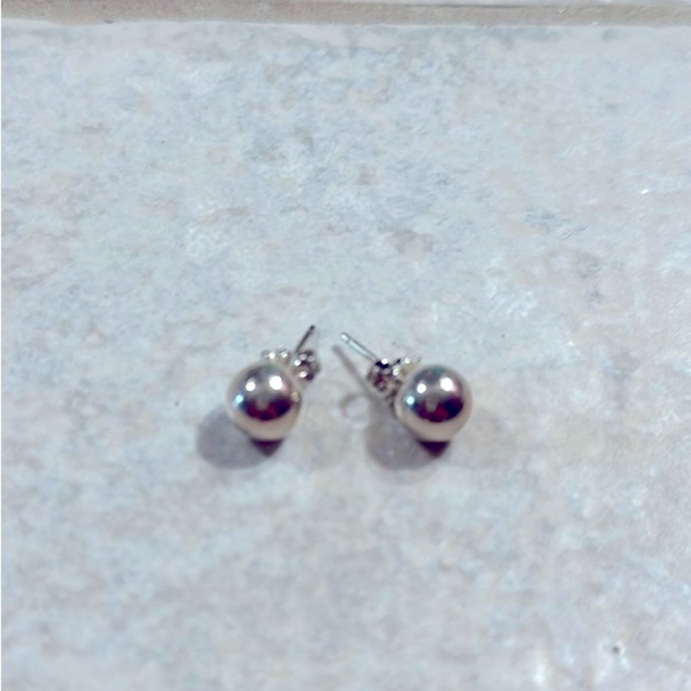 Tiffany Hardwear silver ball earrings.